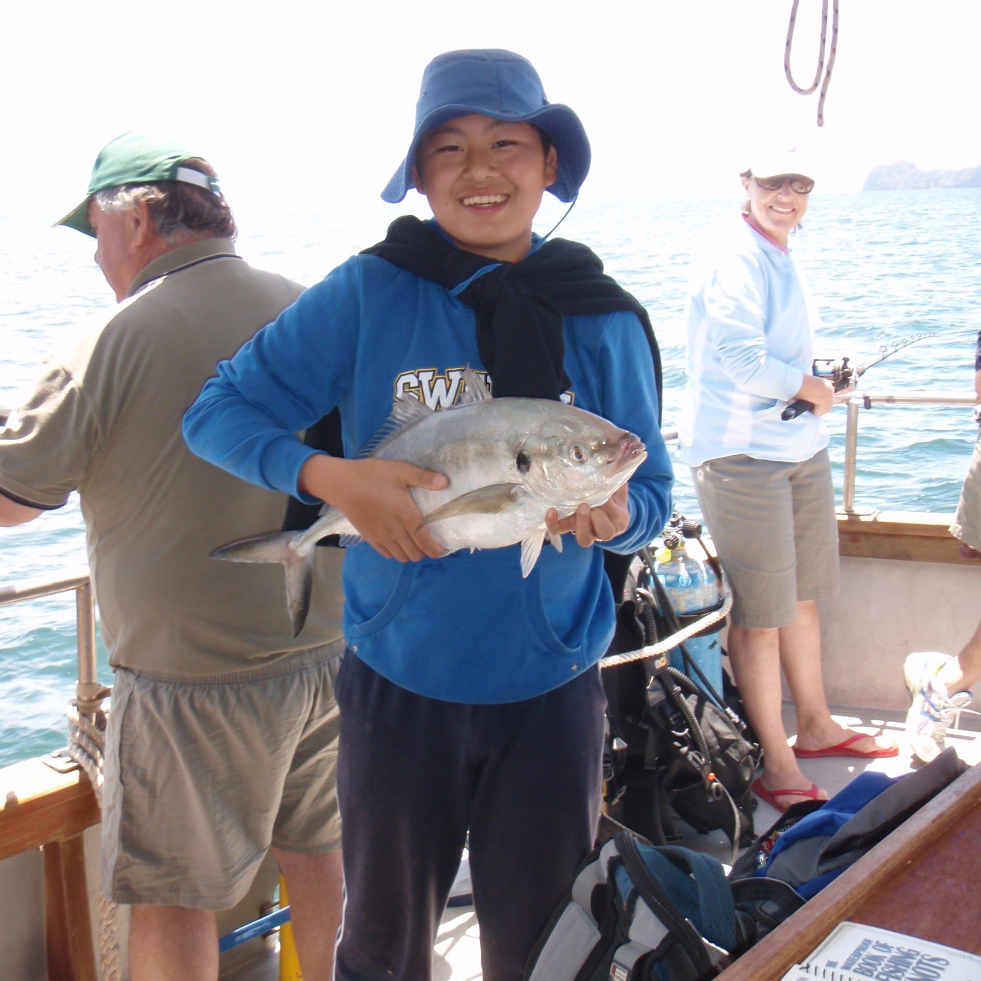 Christina Kim et al. are drinking from a boat